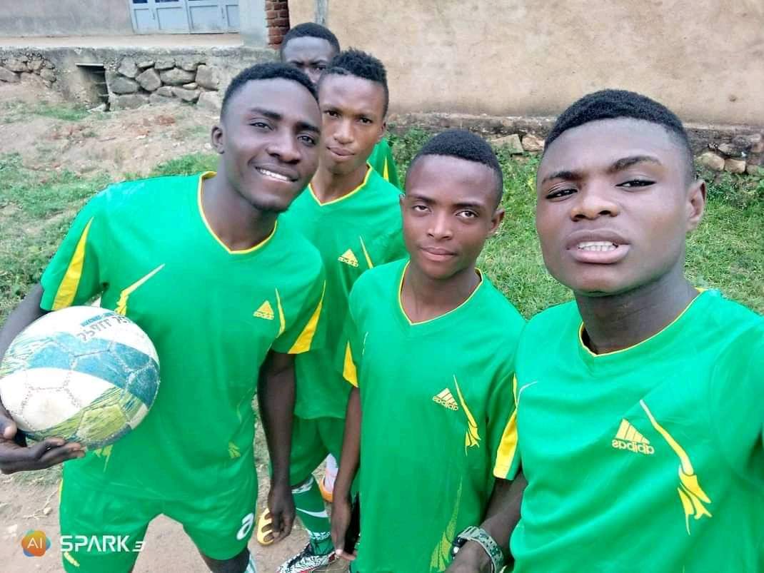 victor with teammates